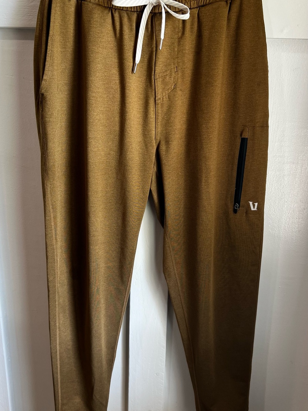 Vuori Men's Athletic Shorts in Rust with White V Logo